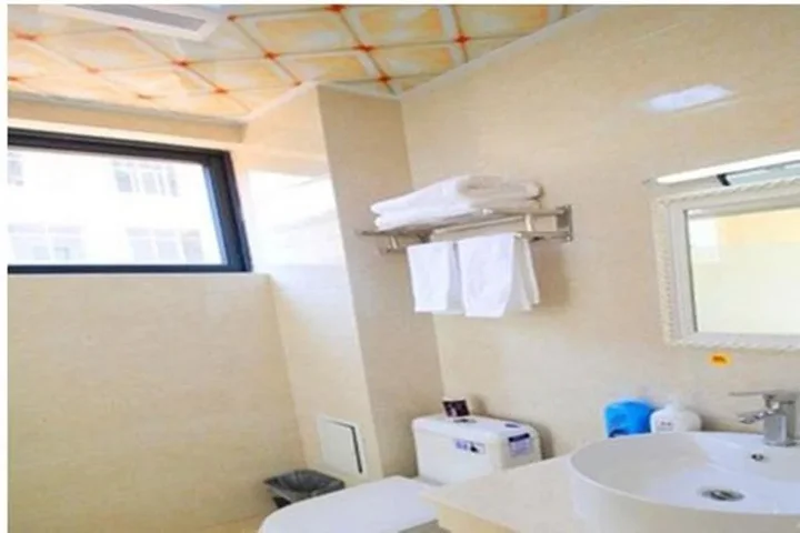 Дали: Mingge Busniess Hotel