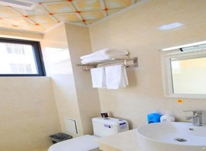 Дали: Mingge Busniess Hotel