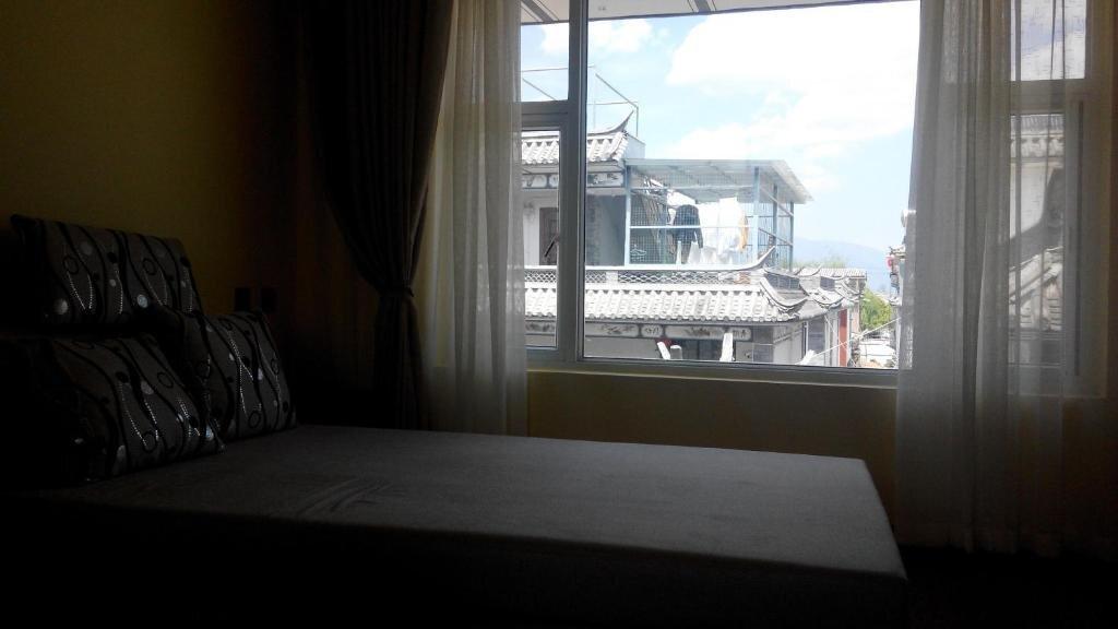 Дали: Mu Zi Li Hostel