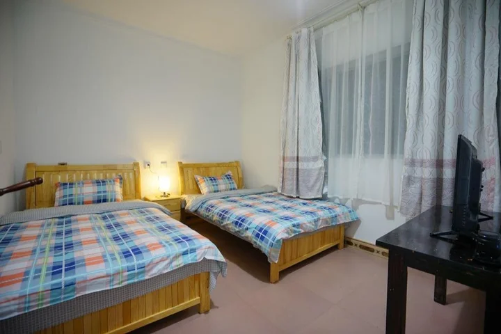 Дали: Mu Zi Li Hostel