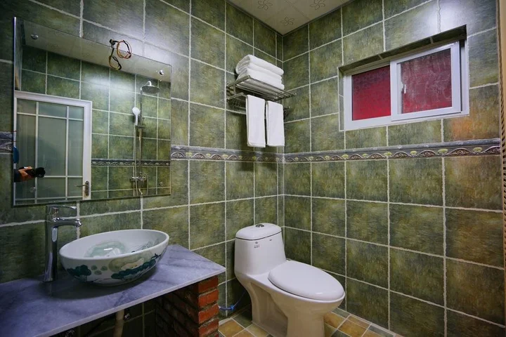 Дали: Mu Zi Li Hostel