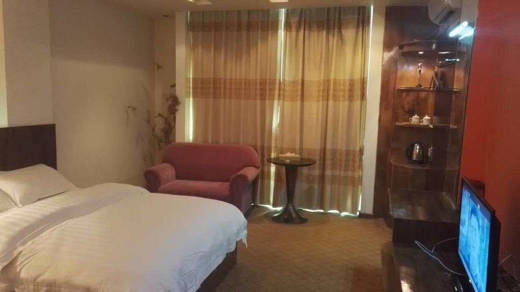 Джиангме: Jinjiang Business Hotel