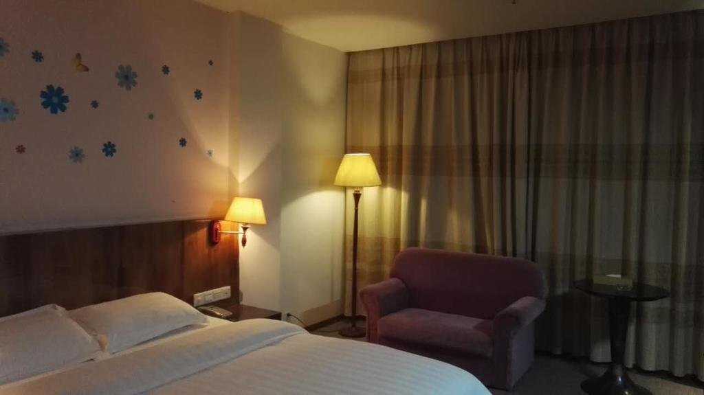 Джиангме: Jinjiang Business Hotel