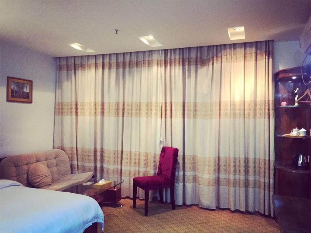 Джиангме: Jinjiang Business Hotel