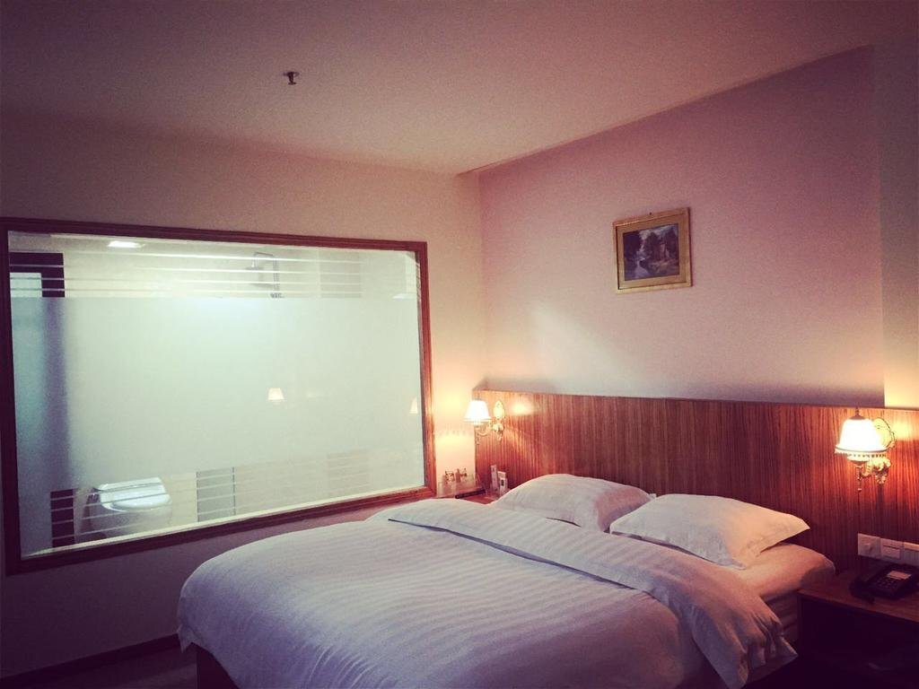 Джиангме: Jinjiang Business Hotel