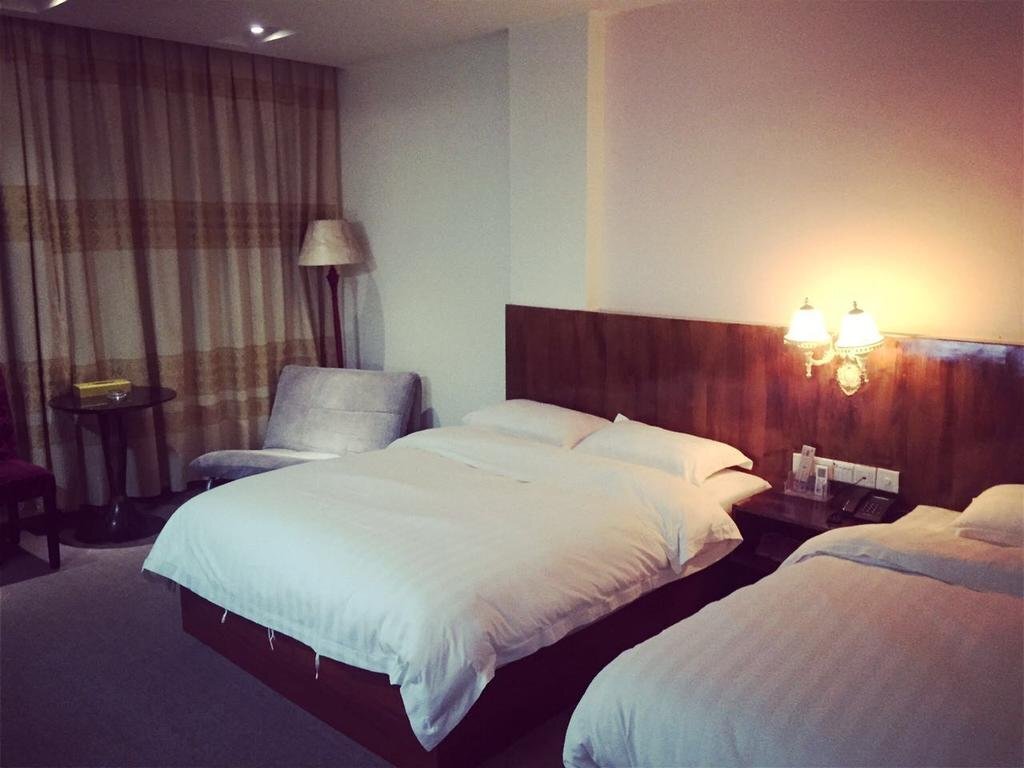Джиангме: Jinjiang Business Hotel