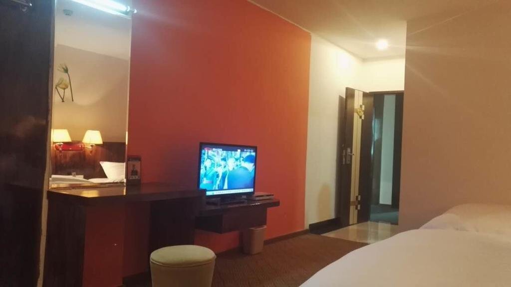 Джиангме: Jinjiang Business Hotel