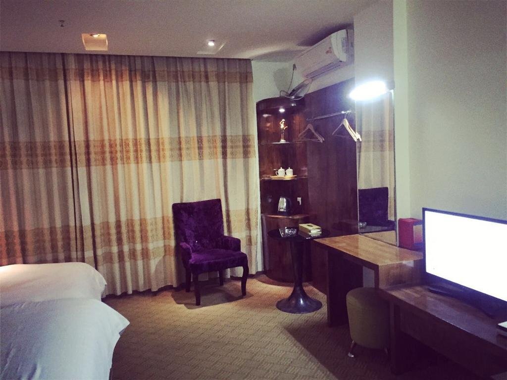 Джиангме: Jinjiang Business Hotel