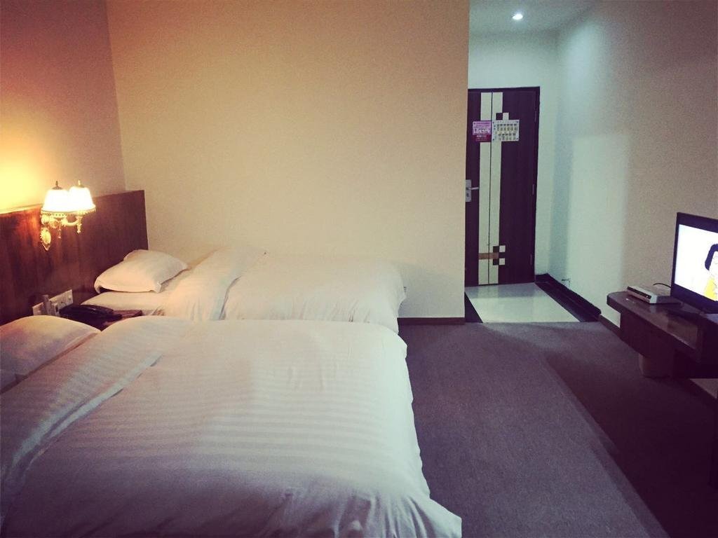 Джиангме: Jinjiang Business Hotel