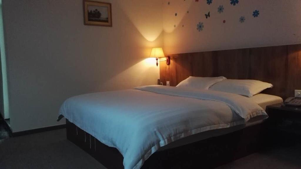 Джиангме: Jinjiang Business Hotel