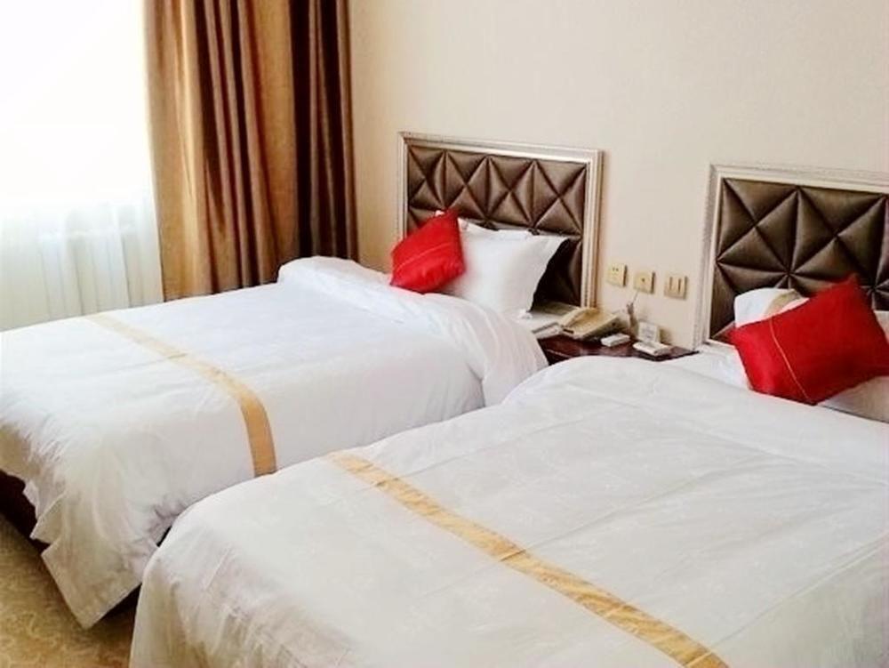 Далянь: Junhao Business Hotel