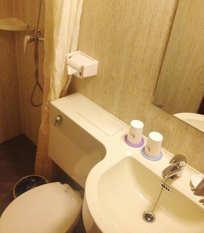 Циндао: Izunco Inn Qingdao TV Mansion