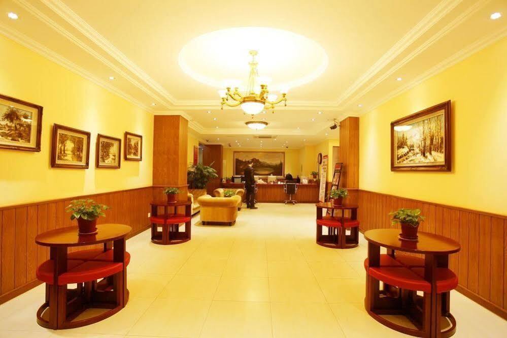 Циндао: Izunco Inn Qingdao TV Mansion