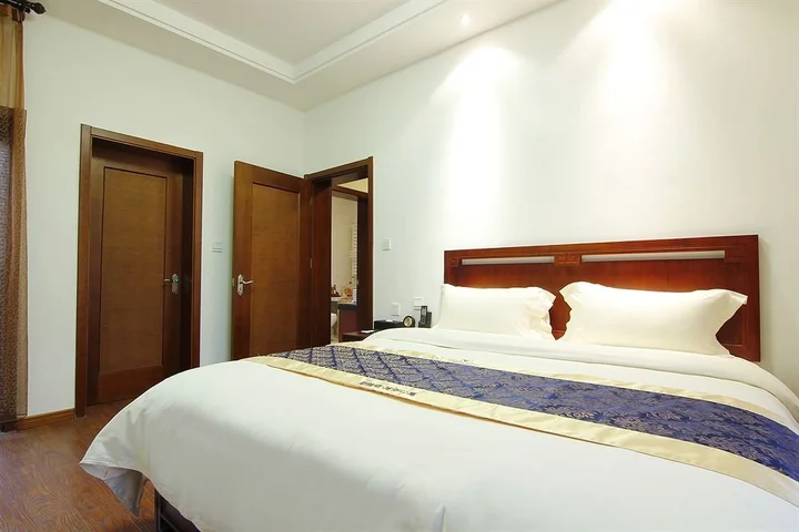 Линьи: Linyi Tujia Sweetome Vacation Rentals