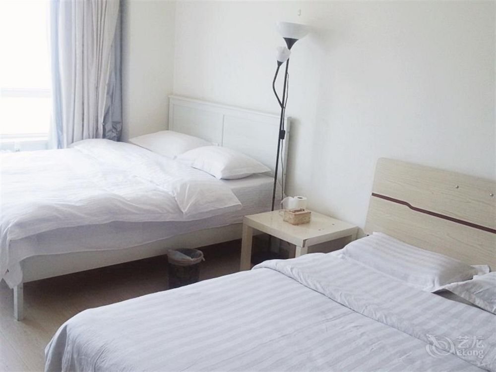 Далянь: Dalian Shun Xin Hotel Apartment