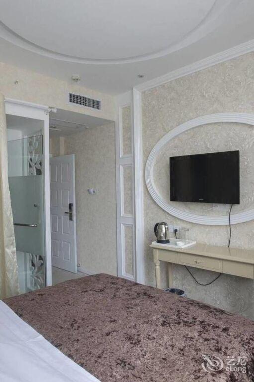 Ухань: Roman Holiday Hotel (Wuhan Xibei Lake)