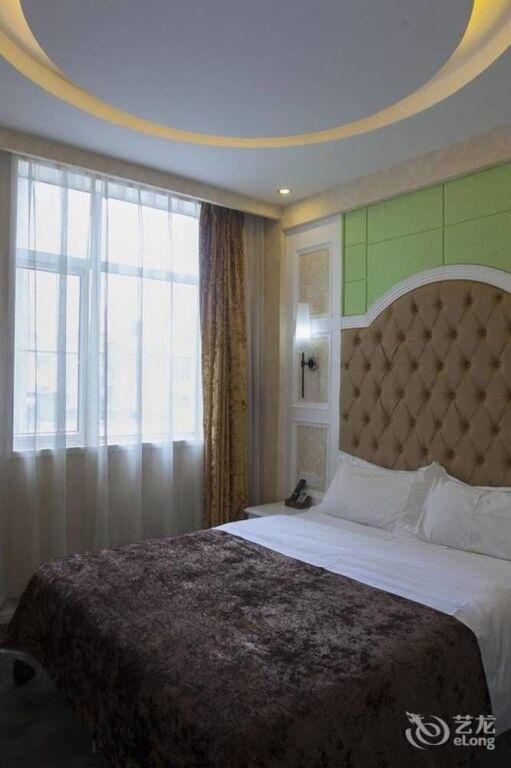 Ухань: Roman Holiday Hotel (Wuhan Xibei Lake)