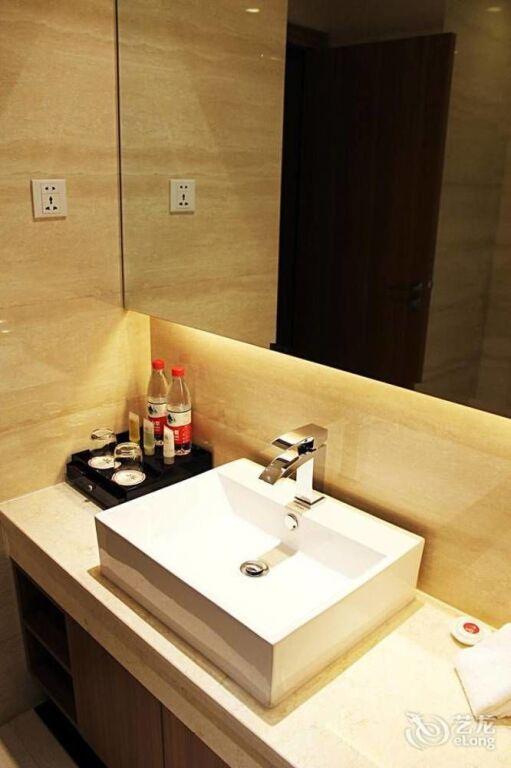 Циньхуандао: Qinhuangdao Peninsula Seasons Hotel And Apartment