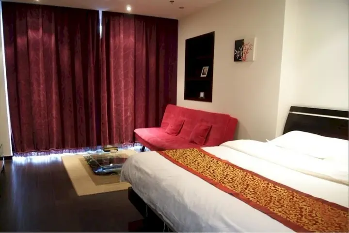 Далянь: Dalian Parkland Ming Jie Hotel Style Apartment