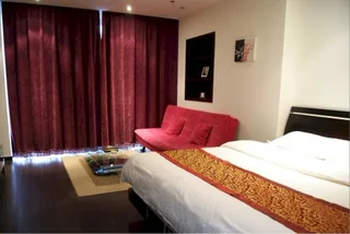 Далянь: Dalian Parkland Ming Jie Hotel Style Apartment