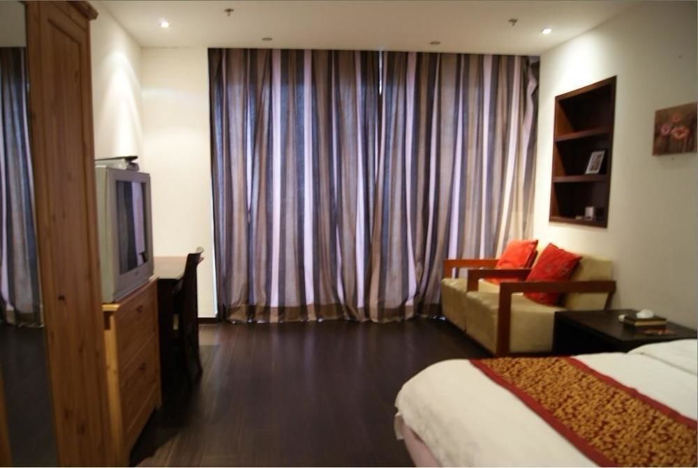 Dalian Parkland Ming Jie Hotel Style Apartment — фото 3