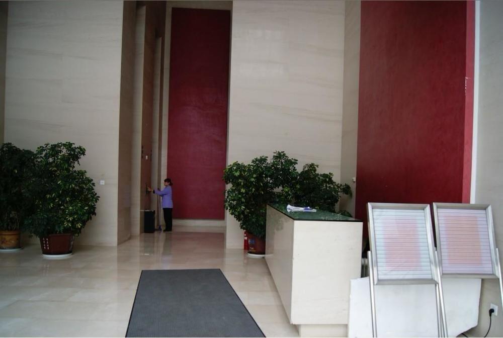 Далянь: Dalian Parkland Ming Jie Hotel Style Apartment