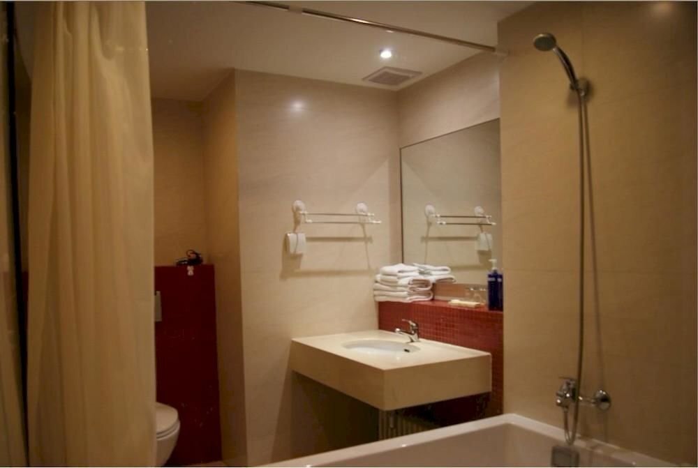 Далянь: Dalian Parkland Ming Jie Hotel Style Apartment