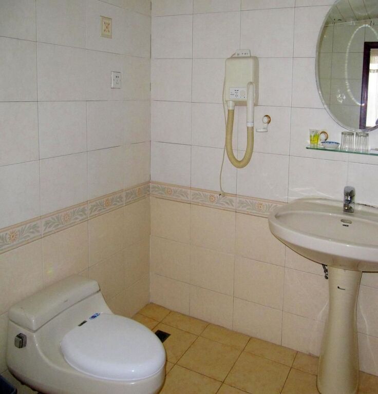 Далянь: Xinyue Business Hotel