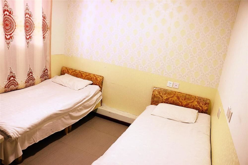 Циндао: Qingdao Peninsula Four Seasons Business Hotel