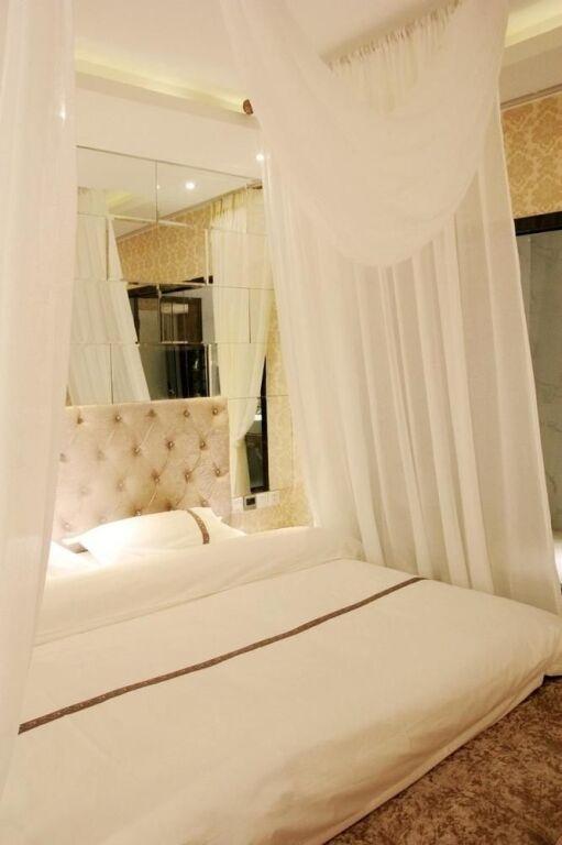 Циндао: Yi Jia 99 Boutiqe Hotel