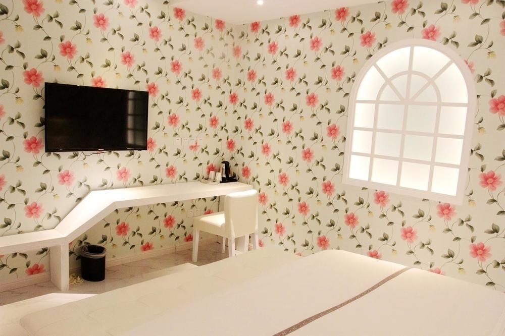 Циндао: Yi Jia 99 Boutiqe Hotel