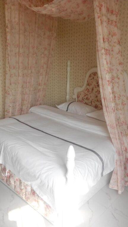 Циндао: Yi Jia 99 Boutiqe Hotel
