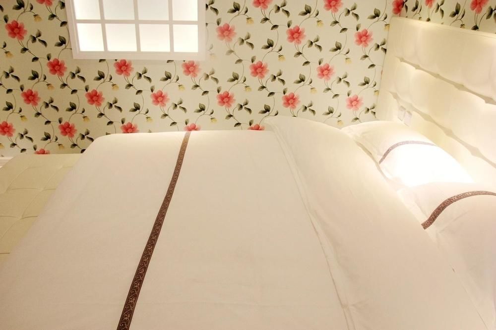 Циндао: Yi Jia 99 Boutiqe Hotel
