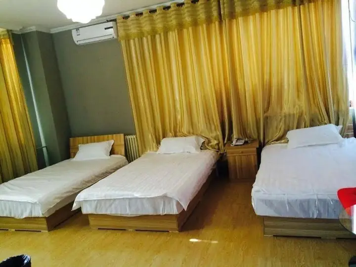 Циндао: Jiawang Family Apartment Hotel