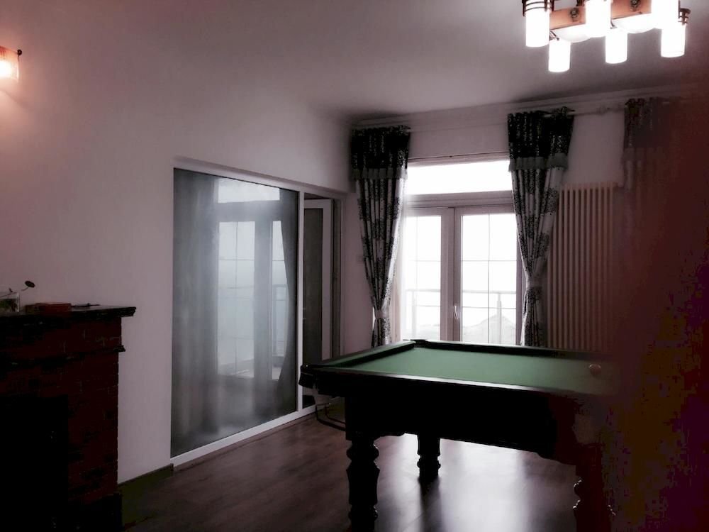 Циндао: Qingdao Langqin Sea View Holiday Villa