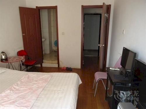 Далянь: Holiday Hotel Apartment