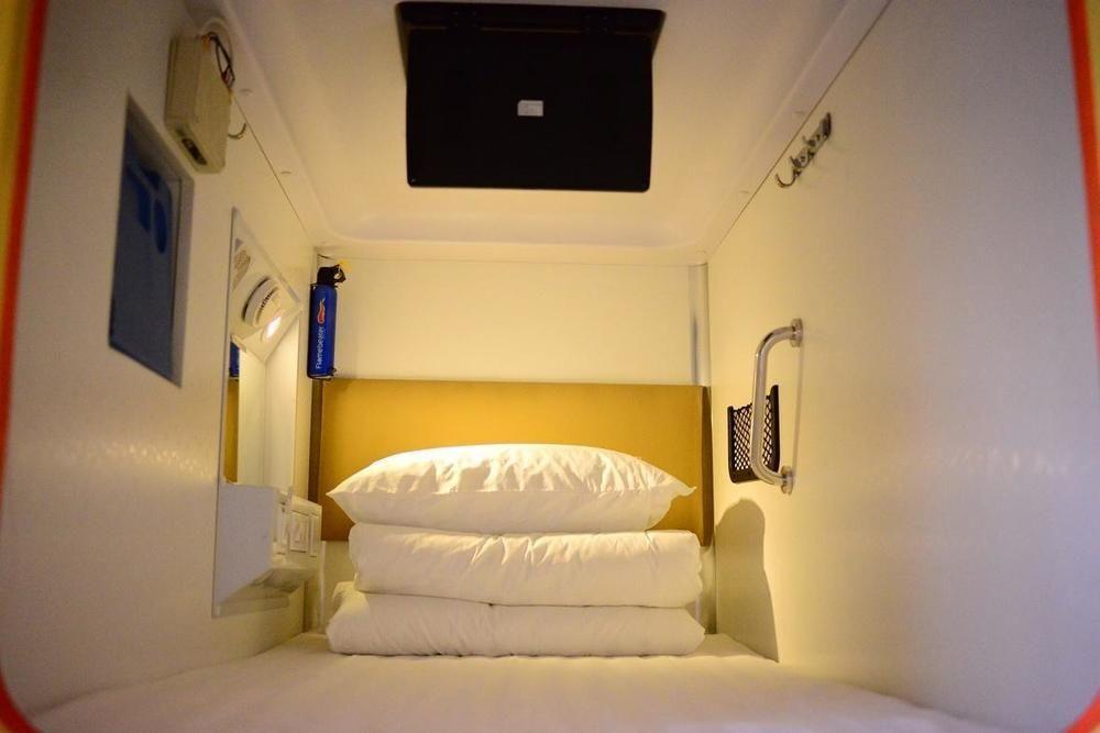 Ханчжоу: Shangjian Capsule Apartment Hangzhou East Railway Station
