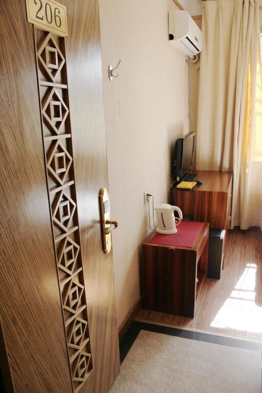 Циндао: Yimin Business Hotel