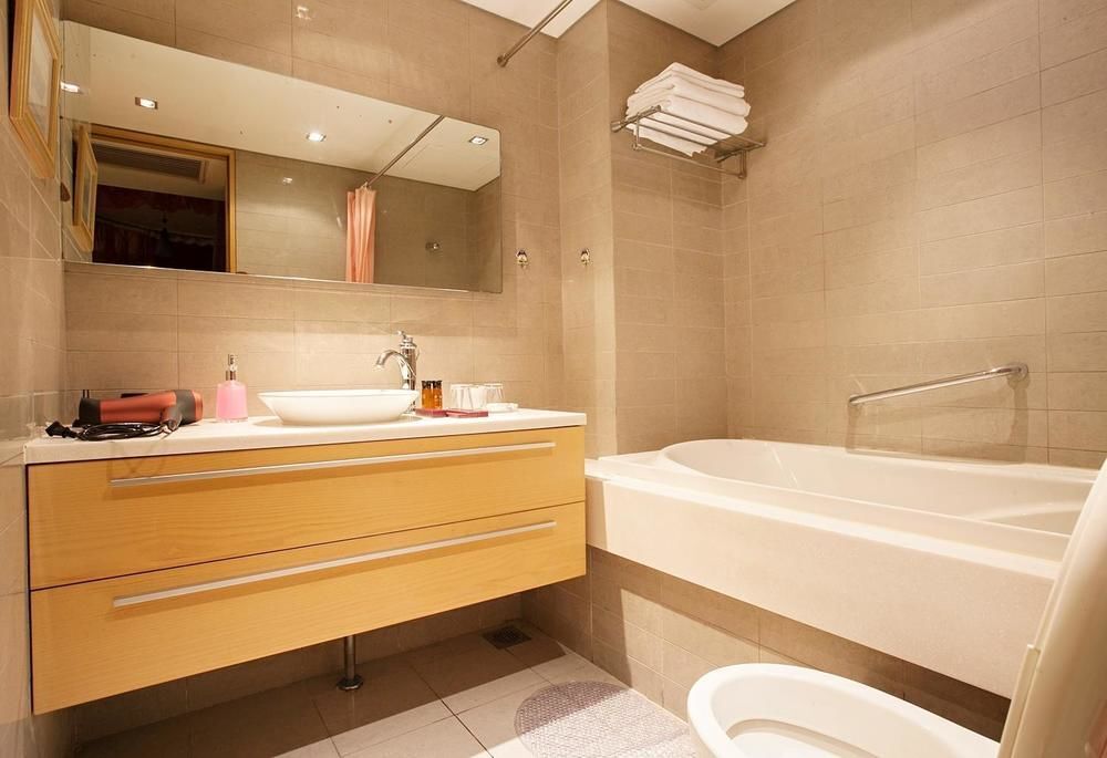Пекин: Shiyu Round-bed Theme Service Apartment