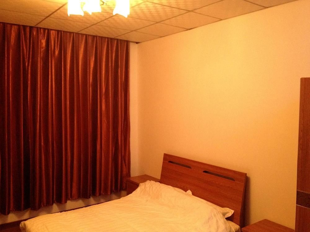 Пекин: Beijing Gujia Hotel Apartment