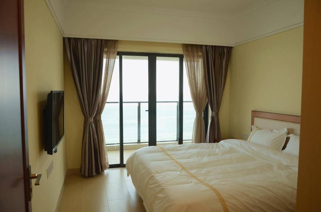 Янгиианг: Ailande Holiday Apartment (Yangjiang Poly Shili Yintan Shop)