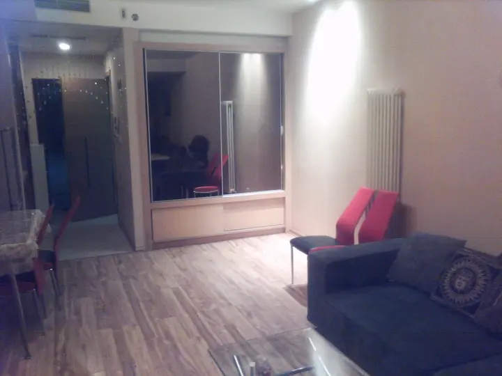 Далянь: Dalian Yijing Yuxuanting Hotel and Apartment