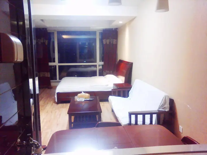 Далянь: Dalian Yijing Yuxuanting Hotel and Apartment
