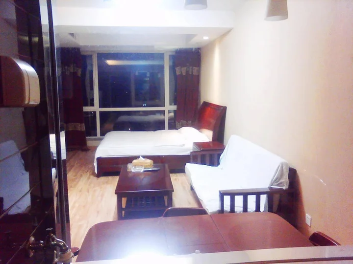 Далянь: Dalian Yijing Yuxuanting Hotel and Apartment