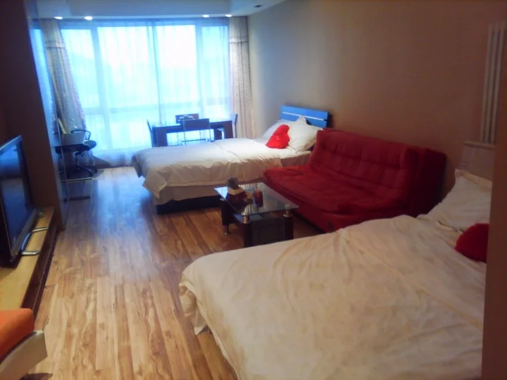 Далянь: Dalian Yijing Yuxuanting Hotel and Apartment