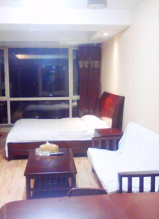 Далянь: Dalian Yijing Yuxuanting Hotel and Apartment