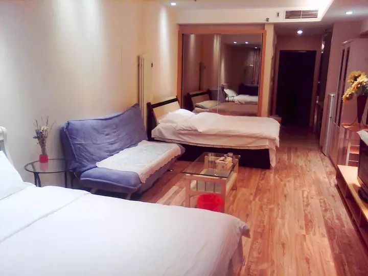 Далянь: Dalian Yijing Yuxuanting Hotel and Apartment
