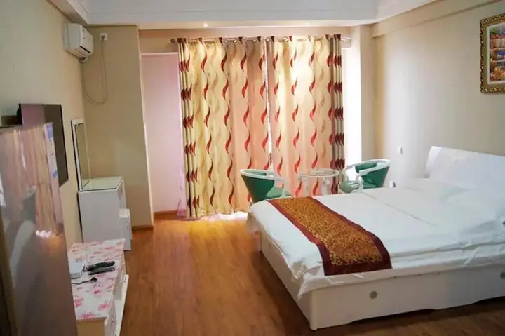 Далянь: Best Coast Hotel Apartment