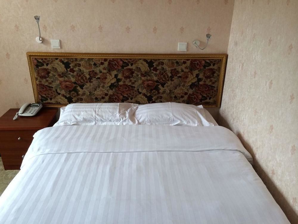 Далянь: Seaside No. 4 Business Hotel- Dalian