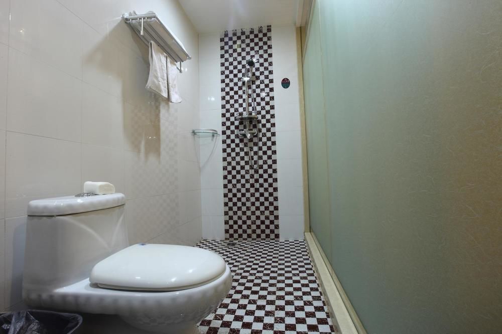 Циндао: Qingdao Yixin Hotel